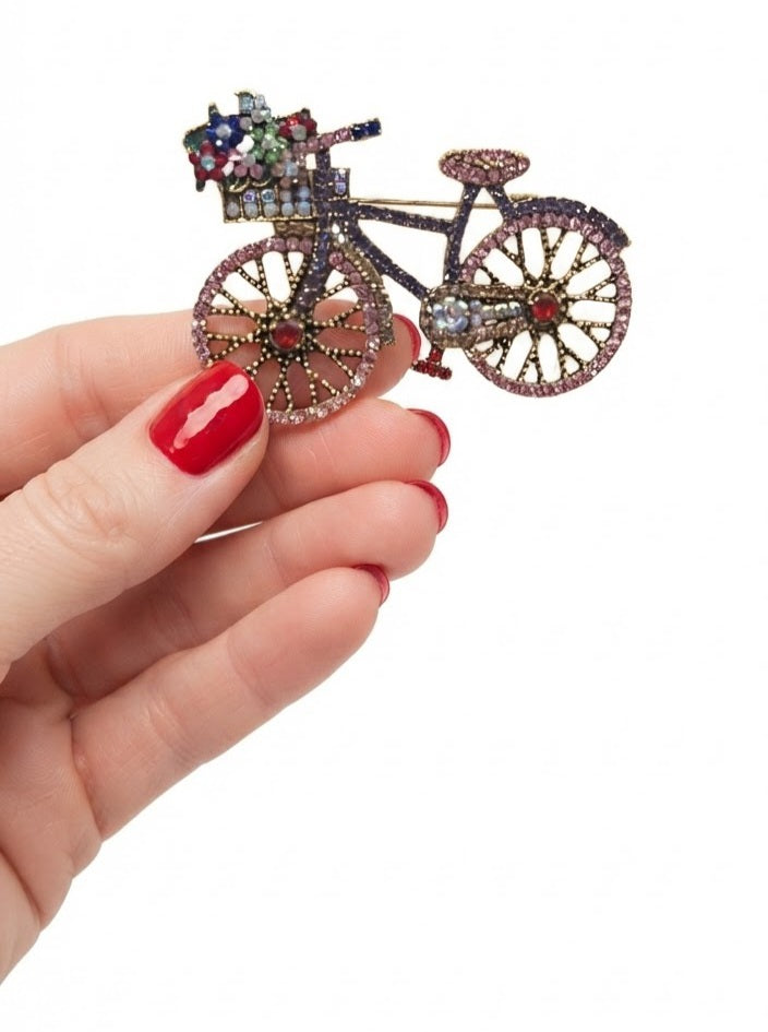 Broche bicicleta aleación multicolor - escala en mano