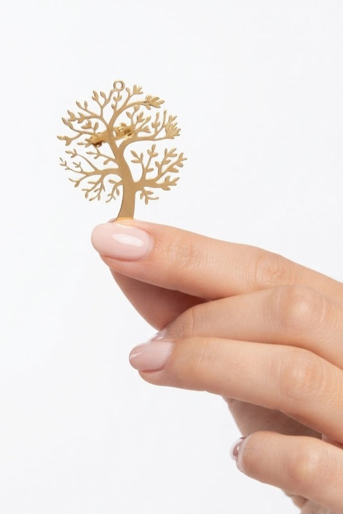Broche árbol de la vida acero dorado detalle calado