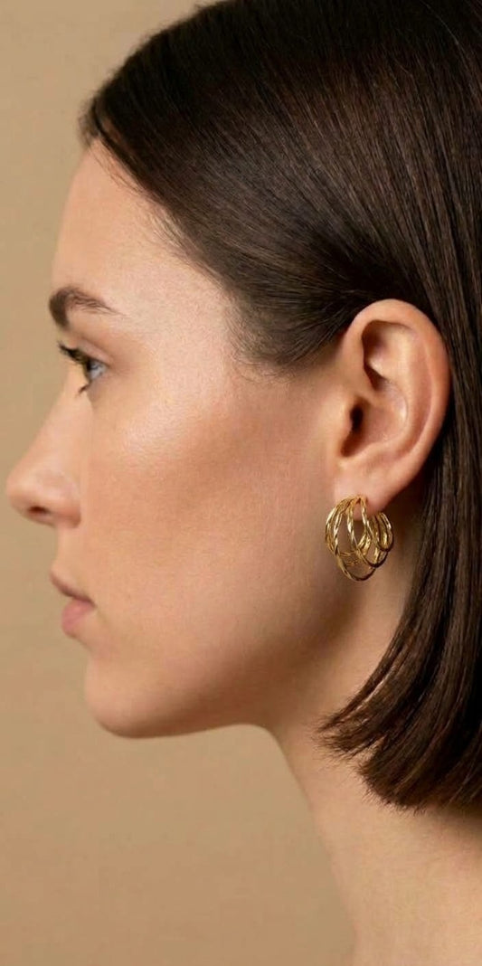 Pendientes aro triple dorado detalle textura