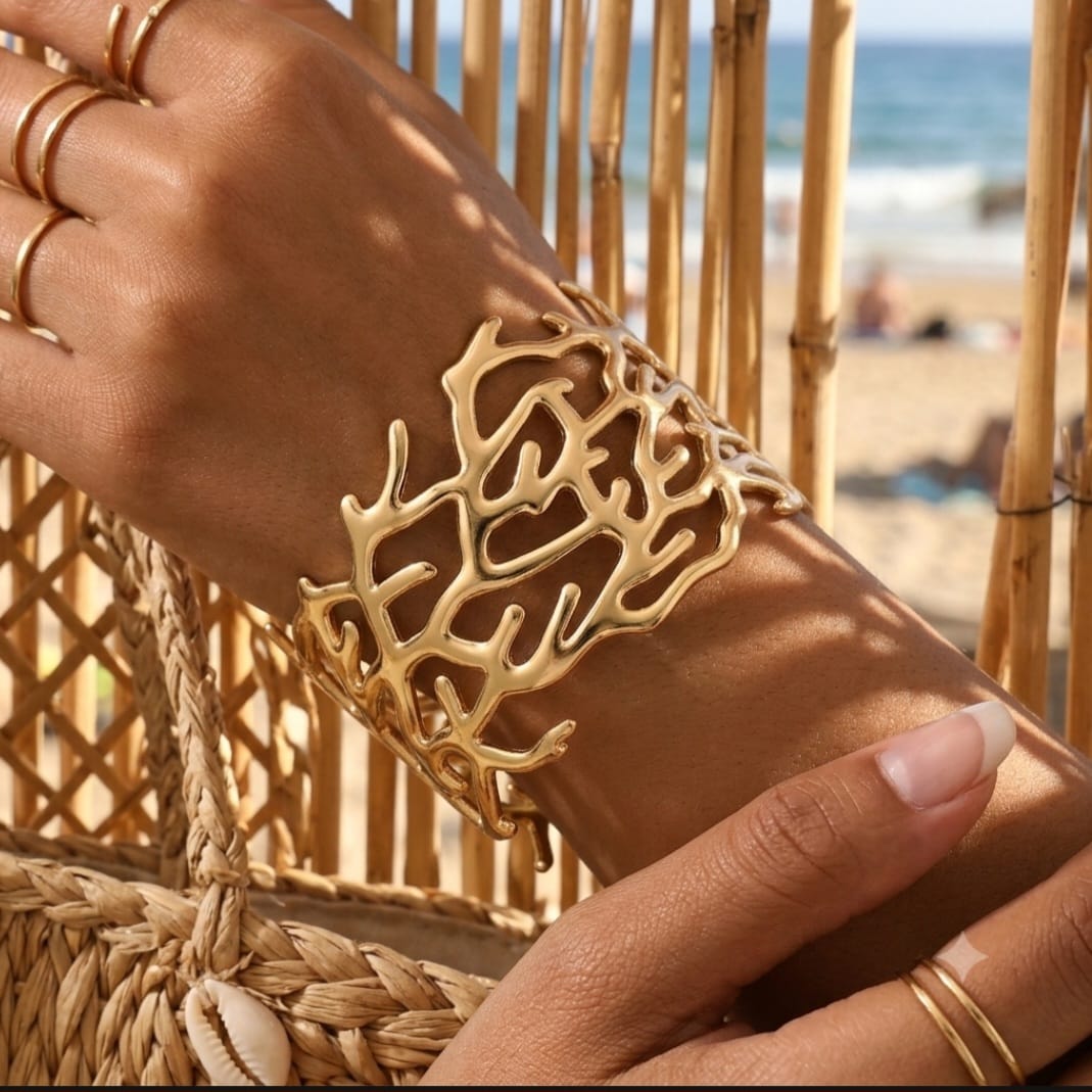 Brazalete coral acero bañado en oro
