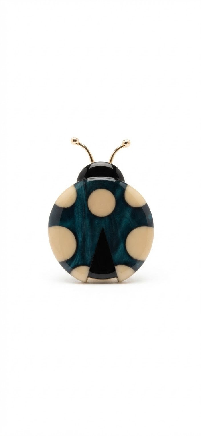 Broche mariquita acrílico azul cián - vista frontal completa
