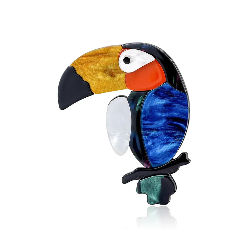 Broche tucán acrílico multicolor - vista frontal fondo blanco