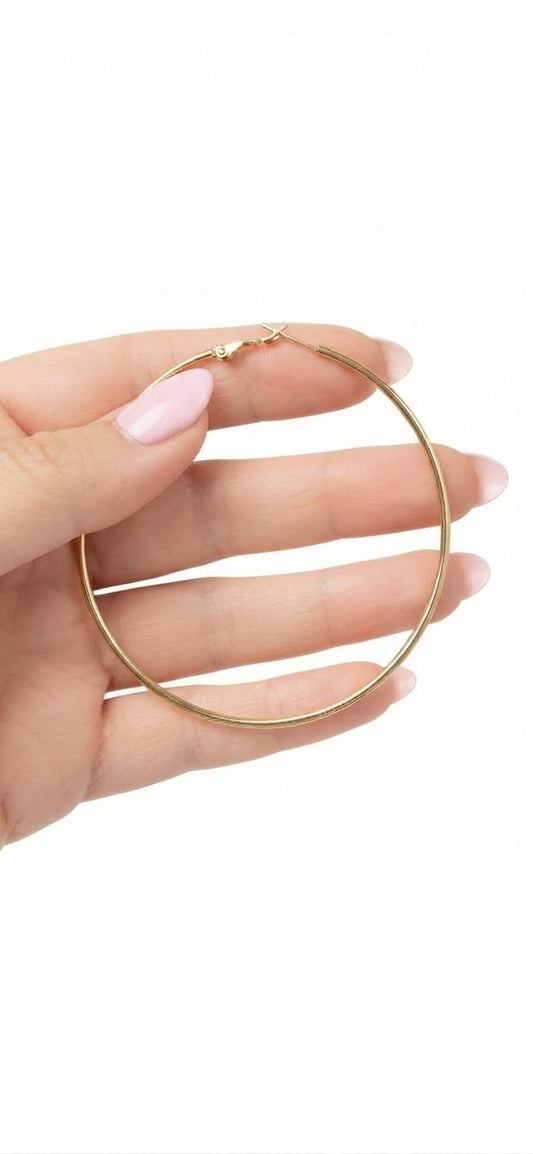 Aros lisos dorados 68mm en mano